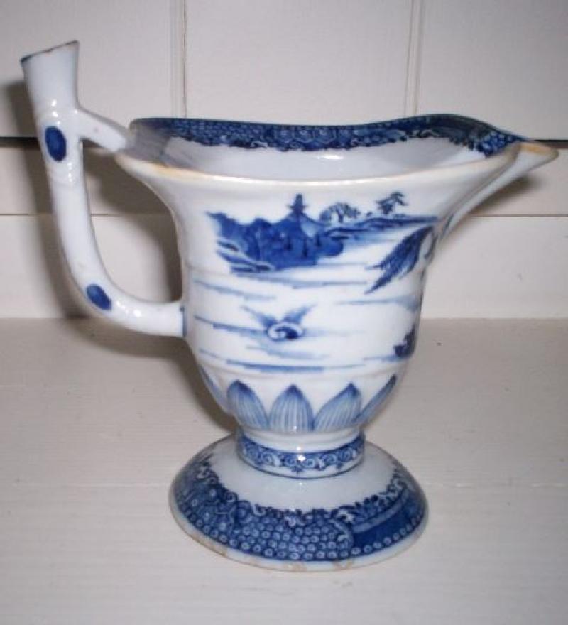 Cream pitcher with copy of Blue Willow pattern