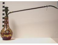 Red glass with enamel and gold decoration.  Smoking fixture is gilt bronze.