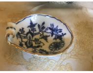 blue and white floral design scalloped dish with upturned handle